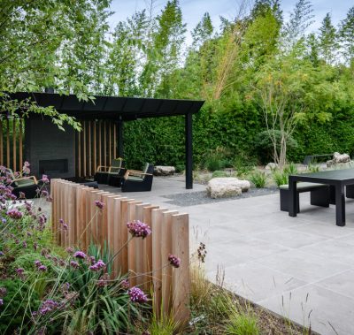 sheltered outdoor living room and dining terrace