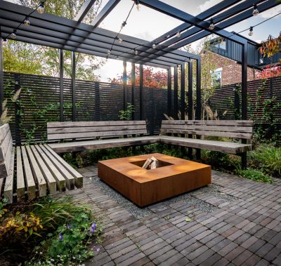 seating under black steel pergola